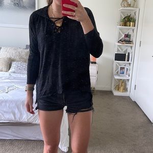 Black and white hooded sweatshirt with tie detail